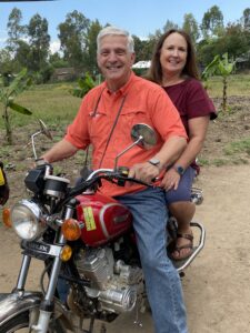 Testing the motorbike we provided for ministry work