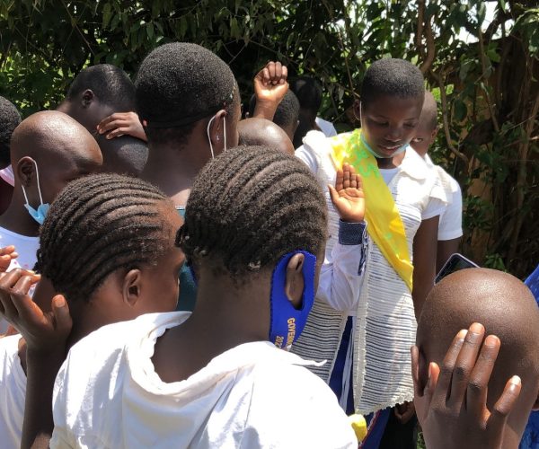 Praying with the sweet children of Mumias, Kenya